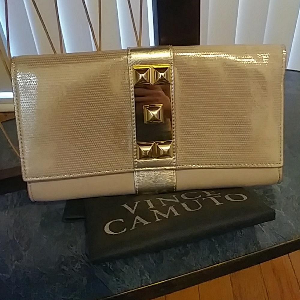 Vince Camuto gold &tan leather clutch